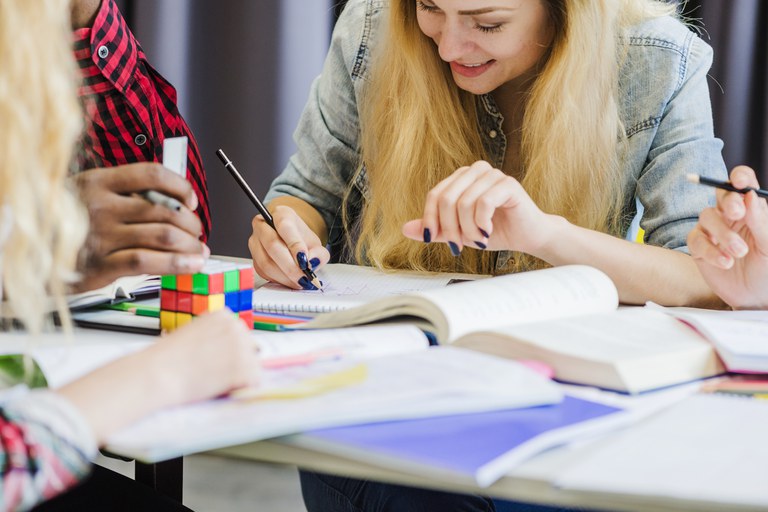 cheerful-people-collaborating-while-studying.jpg
