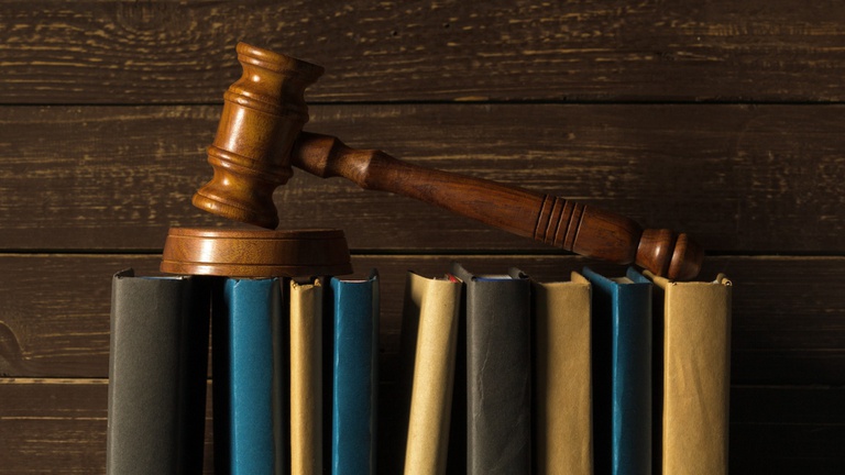 gavel-with-books-old-wooden-desk.jpg
