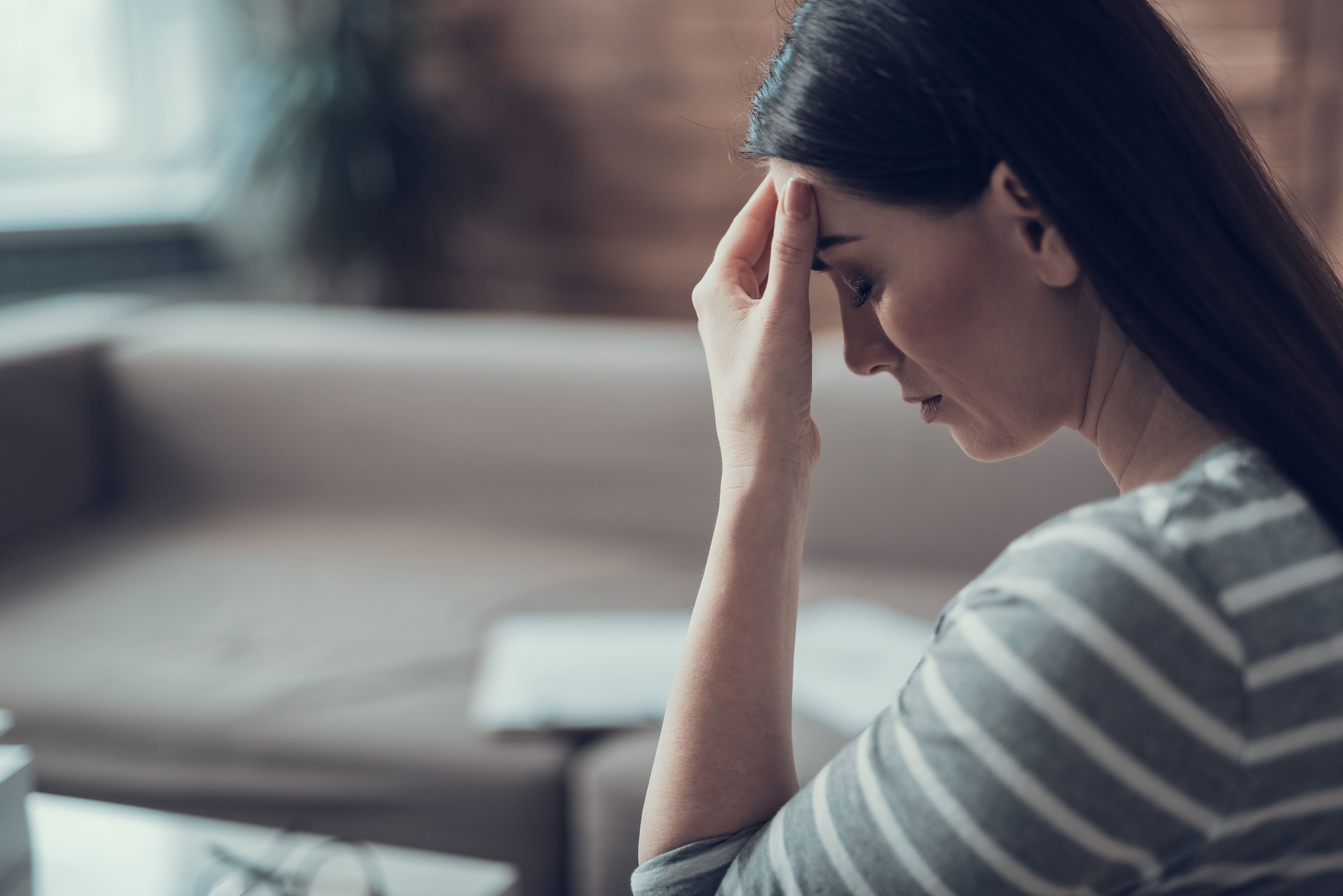 woman-with-a-headache-resting-at-home-2026-04-13-02-42-49-utc (1).jpg