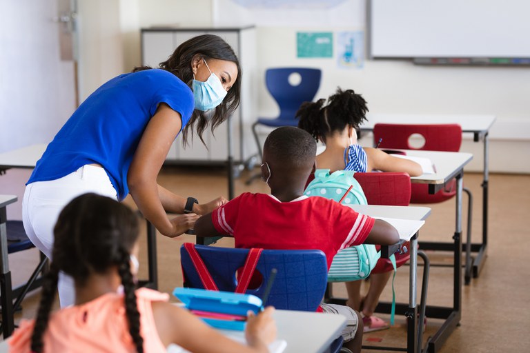 african-american-female-teacher-wearing-face-mask-2021-09-03-06-28-25-utc_portal.jpg