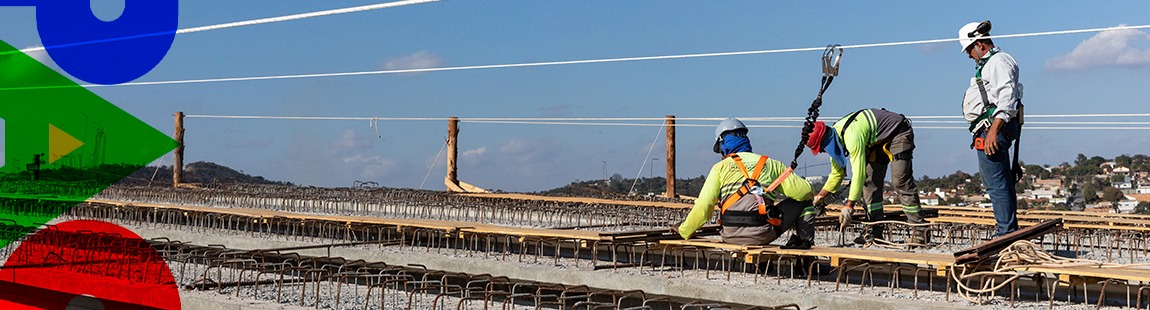 Homens trabalhando nos trilhos