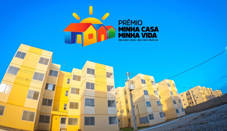 Banner com imagem de conjunto habitacional do programa Minha Casa, Minha Vida com a logo do Prêmio Minha Casa, Minha Vida.