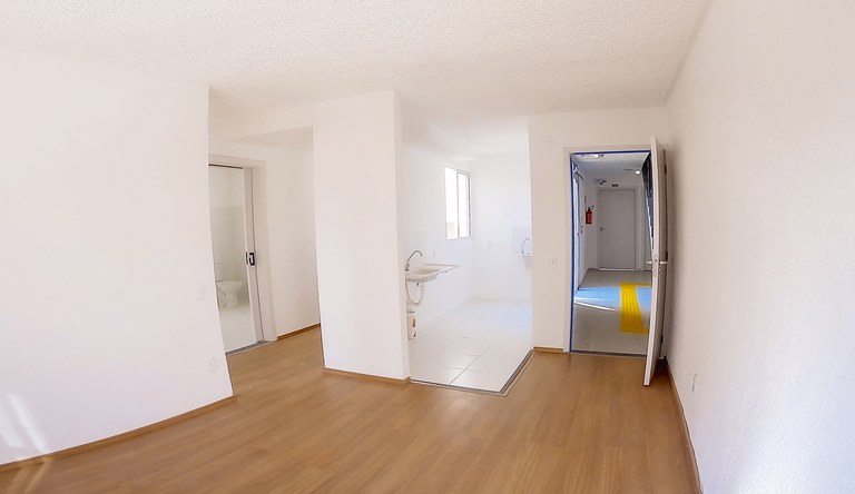 Na foto vista interna de um dos apartamentos do programa, vazio.