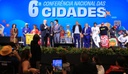 Na foto o presidente da república e o ministro das cidades juntos no palco do evento