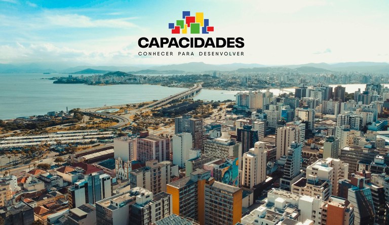 Imagem aérea de prédios de uma cidade.