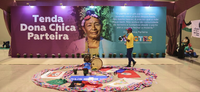 Tenda da 4ª CNGTES presta homenagem à sabedoria e legado de Dona Chica Parteira