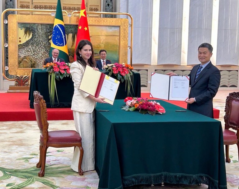 Foto (Créditos - Marcelo Ninio): Diretora Marina Copola representa Colegiado da CVM, na China, para assinatura do memorando com a CSRC