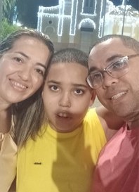 Chirlei Mamede, seu filho Átila e seu esposo.