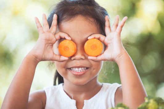 cute-asian-child-girl-having-fun-learn-about-vegetables-with-happiness.jpg