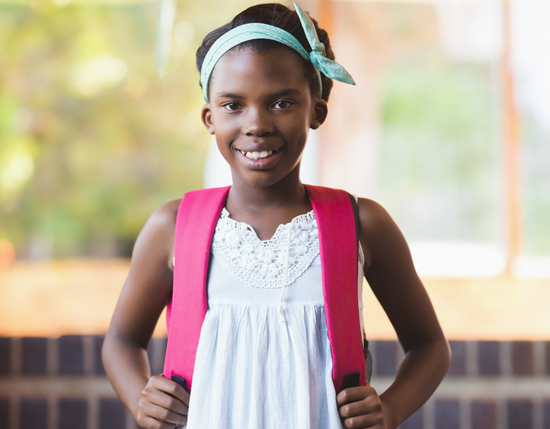 portrait-school-african-girl-standing-school-corridor.png