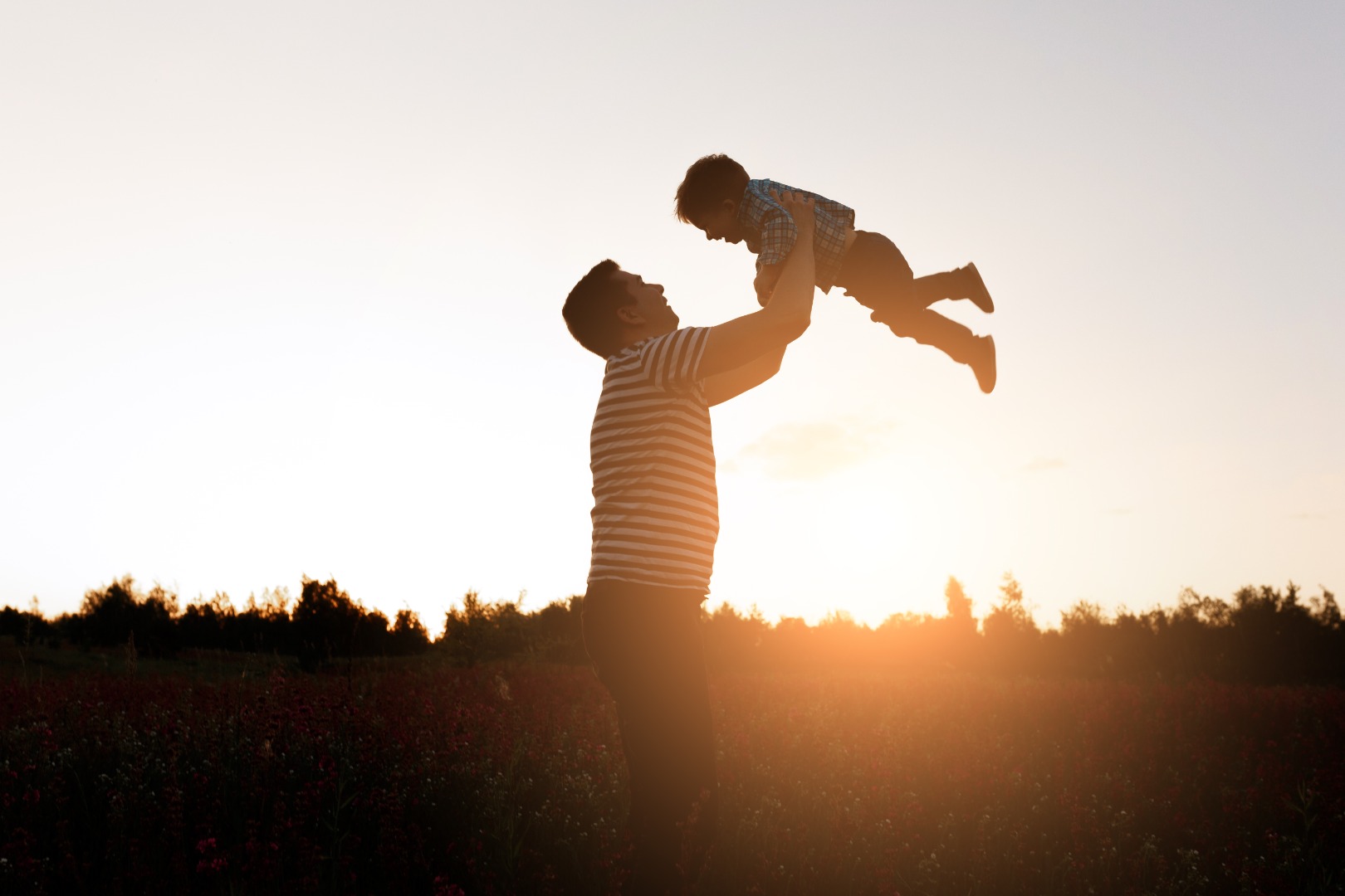 father-son-playing-park-sunset-time-happy-family-having-fun-outdoor.jpg