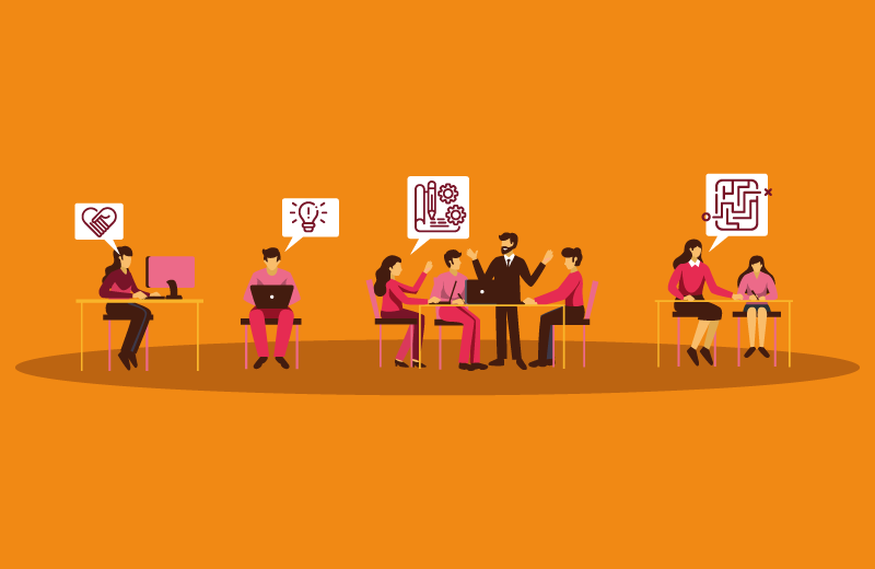 Pessoas conversando sentadas e vendo notebooks