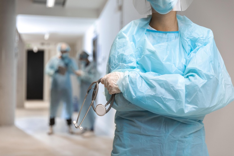 front-view-doctor-wearing-protective-wear-in-the-hospital (1).jpg
