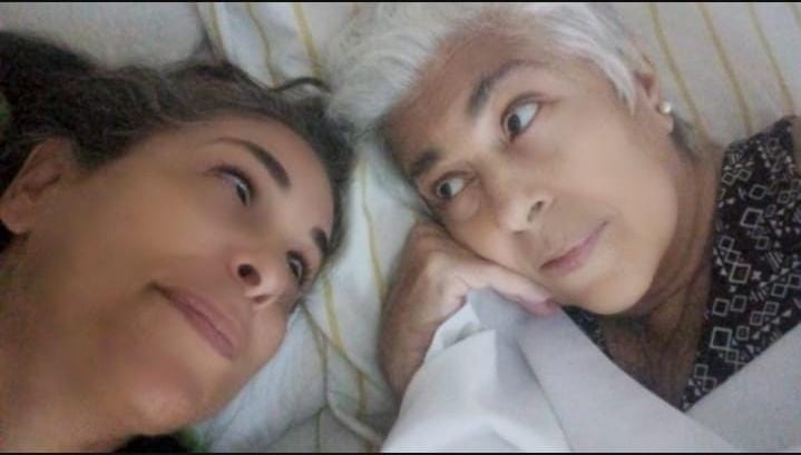 Célia com sua filha, Adriana.