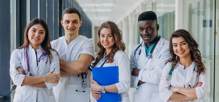 aaaaaa team-of-young-specialist-doctors-standing-in-the-corridor-of-the-hospital.jpg