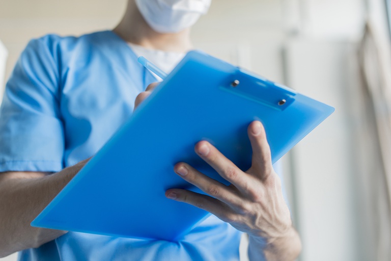close-up-nurse-with-clipboard.jpg