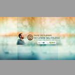 À esquerda, homem ruivo, de casaco de moletom azul, respirando profundamente, sob fundo degradê de marrom para azul. Ao centro, imagem de circulo contendo cigarro cortado). À direita, os dizeres: "Pare de fumar, recupere seu fôlego. 31 de maio, Dia Mundial sem Tabaco".