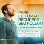 Homem ruivo, de casaco de moletom azul, respirando profundamente, sob fundo degradê de marrom para azul. À direita, os dizeres: "Pare de fumar, recupere seu fôlego. 31 de maio, Dia Mundial sem Tabaco".