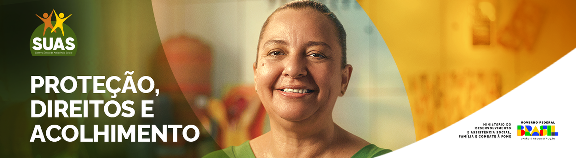 No banner do programa SUAS, há uma imagem de uma mulher sorrindo. Abaixo da imagem, está escrito em letras grandes e legíveis: 'Proteção, Direitos e Acolhimento'.