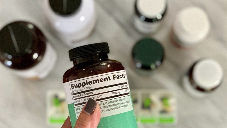 reading-the-label-on-supplement-pill-bottle-2021-09-01-12-54-07-utc.jpg