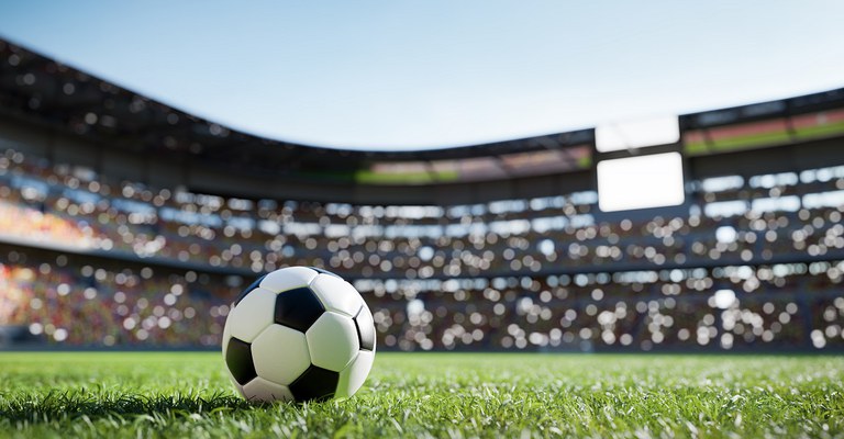 football-soccer-ball-on-grass-field-on-stadium-2021-09-02-20-09-12-utc.jpg