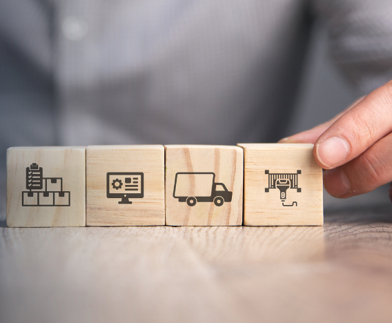 blocos de madeira com ícones de bens imóveis