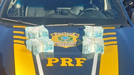 Condutor, com antecedentes por estelionato, não soube informar a procedência do dinheiro transportado em caminhonete