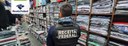 Apreensão de roupas e acessórios falsificados.