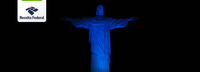 Monumento do Cristo Redentor no Rio de Janeiro é iluminado de azul em homenagem ao 54º aniversário da Receita Federal