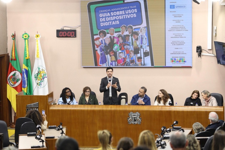 smiley-teenage-girl-helping-little-sister-using-tablet-online-school.jpg